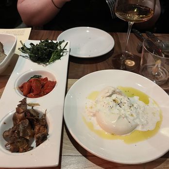 Roscioli - burrata with the side dish of artichokes, sun dried tomatoes and a kale salad. - Italian Near Me - New York, New York Roscioli - burrata with the side dish of artichokes, sun dried tomatoes and a kale salad. - Italian Near Me - New York, New York