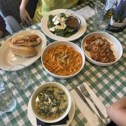 Capperi - Chicken Parm, goat cheese salad, famous meatballs, vodka penne, and spinach egg soup.