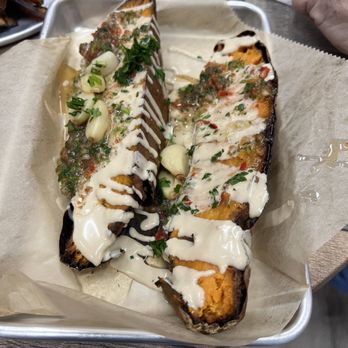 Hamitbach - Sweet potato appetizer in tahini with garlic and chimichuri - Mediterranean Near Me - San Diego, California Hamitbach - Sweet potato appetizer in tahini with garlic and chimichuri - Mediterranean Near Me - San Diego, California