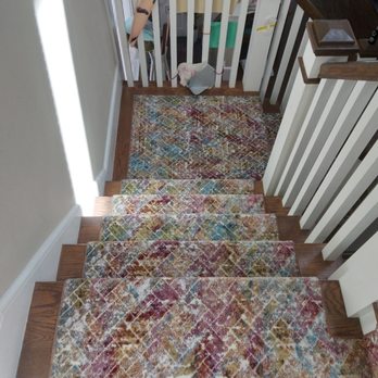 Wholesale Carpet - a carpeted stair with a multicolored design - Carpeting Near Me - Malden, Massachusetts