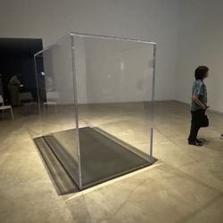 Blaffer Art Museum - Exhibit resembles NOLA crypt. New Orleans uses above-ground tombs because the city sits at or below sea level with a very high water table.