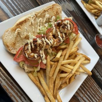 Millie's Restaurant and Catering - Shrimp po boy ($17) - American Near Me - Daytona Beach, Florida Millie's Restaurant and Catering - Shrimp po boy ($17) - American Near Me - Daytona Beach, Florida