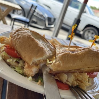 Nury's On Main - Outside seating/ Shrimp Po'boy - Seafood Near Me - Fredericksburg, Texas Nury's On Main - Outside seating/ Shrimp Po'boy - Seafood Near Me - Fredericksburg, Texas