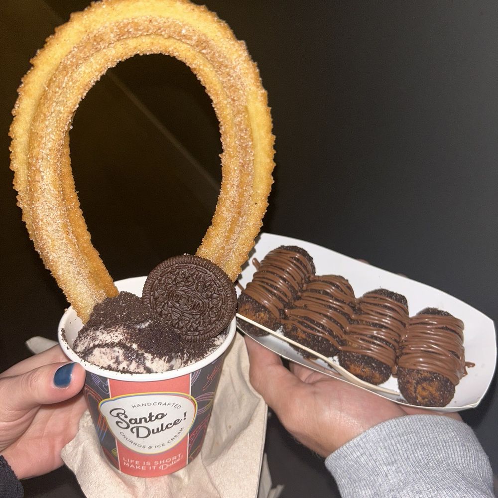 Cinnamon Cookies and Cream Ice Cream with cinnamon and sugar churro. Nutella tequenos Cinnamon Cookies and Cream Ice Cream with cinnamon and sugar churro. Nutella tequenos