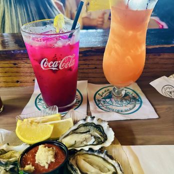 Luau Larry's - Oysters, dragon lemonade (left), and wiki wacker (right) - New American Near Me - Avalon, California