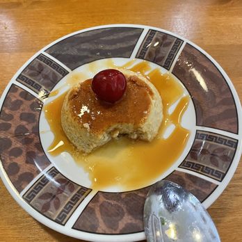 Lago Cafe - Flan with a bite or two missing -- eggy and delicious - Cuban Near Me - Santa Fe, New Mexico