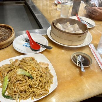 DD Soup Dumpling - (Left) combination lo mein, (top right) crab meat pork soup dumpling. - Chinese Near Me - New York, New York