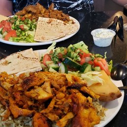 Lamb and chicken shawarma. Chicken is the first plate.