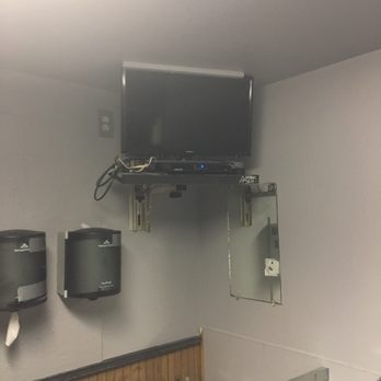 Duchess - TV in restroom,, look at that setup - Dive Bars Near Me - Seattle, Washington