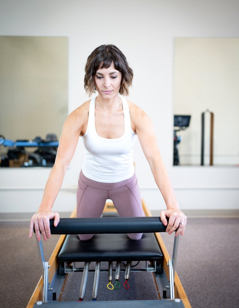 NeuroWell Pilates & Physical Therapy Logo
