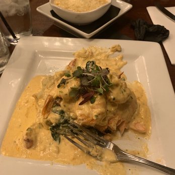 Le Culture Cafe - Salmon Tower and a side of fried corn.It's lobster, shrimp over salmon, over salmon and mashed potatoes with some Alfredo type sauce. - Cafes Near Me - Detroit, Michigan Le Culture Cafe - Salmon Tower and a side of fried corn.It's lobster, shrimp over salmon, over salmon and mashed potatoes with some Alfredo type sauce. - Cafes Near Me - Detroit, Michigan