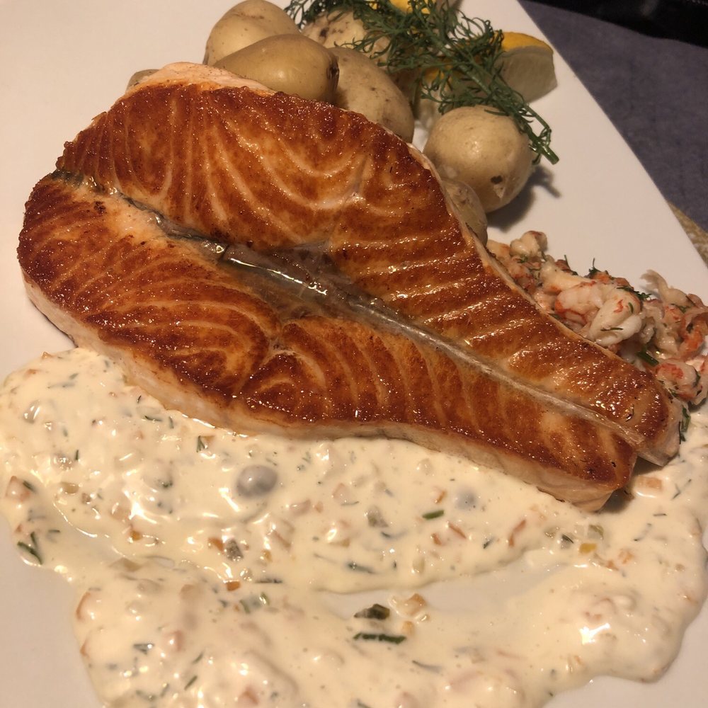 Salve - Grilled salmon with crawfish and side of potatoes and very creamy tarter type sauce. - Bistros Near Me - Helsinki, 18