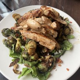 Brussels sprouts salad with chicken! So yummy and big. Needed to take half home!! Brussels sprouts salad with chicken! So yummy and big. Needed to take half home!!