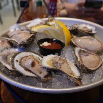 The Oyster Bar - A dozen gulf Oysters on the Half Shell* - Bars Near Me - Las Vegas, Nevada
