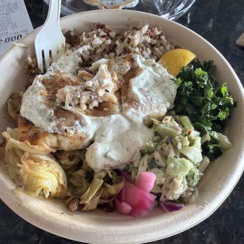 Urbane Cafe - The "Really Good Fish Bowl". Barramundi fish and was really good! Came with a side of delicious focaccia bread salted - Salad Near Me - Orange, California