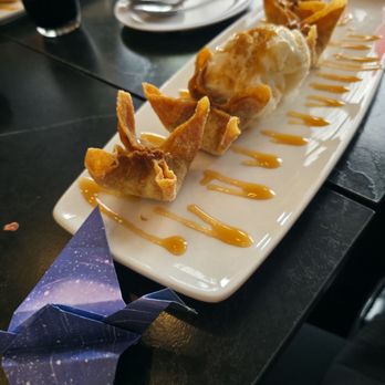 Sushi Spot - Fried wonton with apple pie filling and a scoop of ice cream - Sushi Bars Near Me - Colorado Springs, Colorado Sushi Spot - Fried wonton with apple pie filling and a scoop of ice cream - Sushi Bars Near Me - Colorado Springs, Colorado