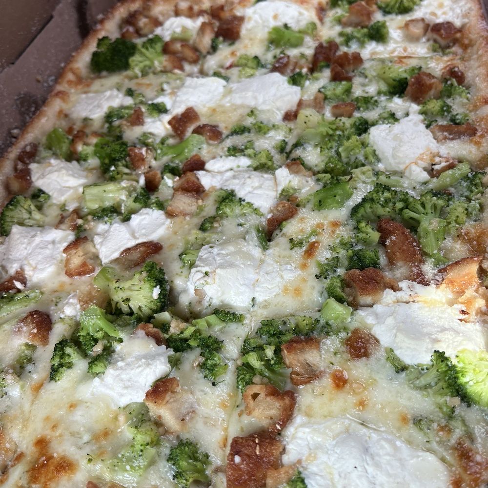 Manhattan Express Pizza - Chicken and broccoli square pizza with ricotta added. - Pizza Near Me - Amsterdam, New York Manhattan Express Pizza - Chicken and broccoli square pizza with ricotta added. - Pizza Near Me - Amsterdam, New York