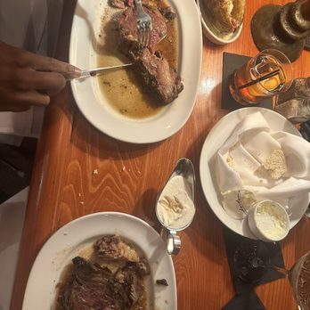 Jacksons Steakhouse - Prime rib with loaded baked potatoes the top prime rib is med rare and the bottom one is medium - Steakhouses Near Me - Pensacola, Florida Jacksons Steakhouse - Prime rib with loaded baked potatoes the top prime rib is med rare and the bottom one is medium - Steakhouses Near Me - Pensacola, Florida