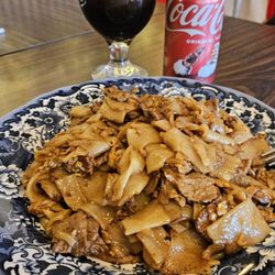 Chunn Thai Cuisine - Pad see ew no veggies, coke and thai ice coffee.