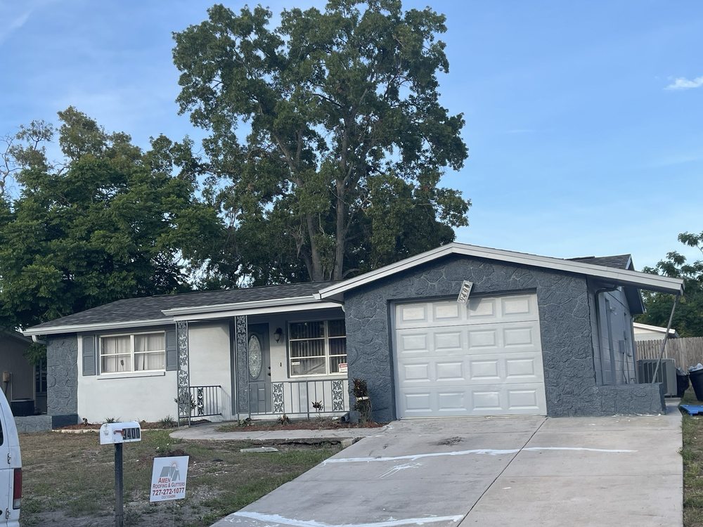 Slide of Amen Roofing & Gutter