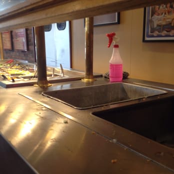 Shakey's Pizza Parlor - Bottle of cleaning spray next to the salad bar. I'm no expert but C'MON!?!! - Pizza Near Me - Brea, California