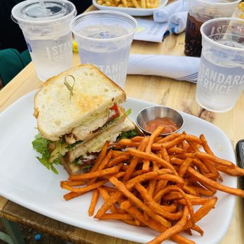 Standard Service - Heath - The grilled chicken sandwich on sourdough bread with sweet potato fries was delicious! - New American Near Me - Heath, Texas