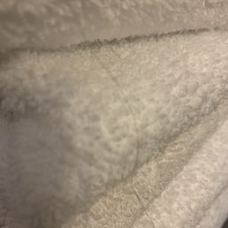 Towel with hair on it.
