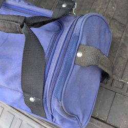 TW Carrol - Repaired tear in a 30 year old piece of luggage