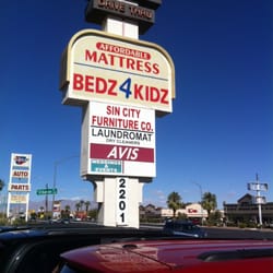 Avis Rent A Car - Avis sign in the Arby's parking lot...