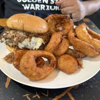 My Friends Place - Kalua Pork Burger with Onion Rings - American Near Me - Manteca, California My Friends Place - Kalua Pork Burger with Onion Rings - American Near Me - Manteca, California