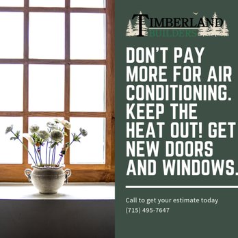 Timberland Builders - a vase of flowers in front of a window with the words don't pay more for air conditioning keep the heat - General Contractors Near Me - Janesville, Wisconsin Timberland Builders - a vase of flowers in front of a window with the words don't pay more for air conditioning keep the heat - General Contractors Near Me - Janesville, Wisconsin