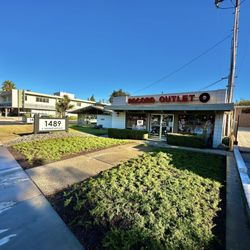 Record Outlet - The landscape people doing a great job with the garden outside Record Outlet.
