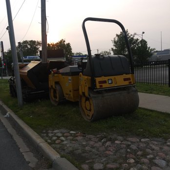 ARRP Paving - There's a whole bed of flowers under that machinery. Photo location at Bloomingdale and Harlem avenue, Chicago. - General Contractors Near Me - Schiller Park, Illinois ARRP Paving - There's a whole bed of flowers under that machinery. Photo location at Bloomingdale and Harlem avenue, Chicago. - General Contractors Near Me - Schiller Park, Illinois