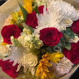 a bouquet of red, white and yellow flowers a bouquet of red, white and yellow flowers