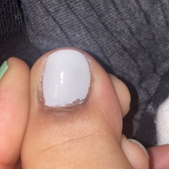 Nails By Lynn - Messy edges. She filed them after they cured and it looks like some chipped at the bottom. - Nail Salons Near Me - San Antonio, Texas