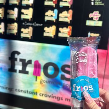 Frios Gourmet Pops - a person holding a candy bar - Ice Cream & Frozen Yogurt Near Me