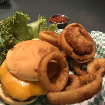 Three Fingered Jacks Saloon & Cafe - Basic burger with cheese and side of onion rings - American Near Me - Winthrop, Washington Three Fingered Jacks Saloon & Cafe - Basic burger with cheese and side of onion rings - American Near Me - Winthrop, Washington