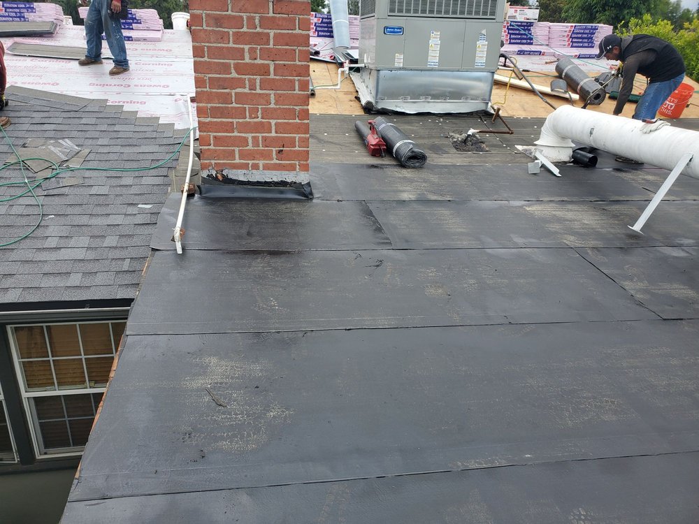 Slide of Trujano Roofing