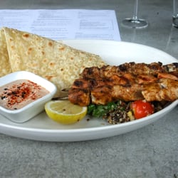 Mornington Pier - Mixed Fish Grill chargrilled kebabs, house spice rubbed, chickpea, quinoa, pomegranate & corn salad, piadina, spiced yoghurt dip