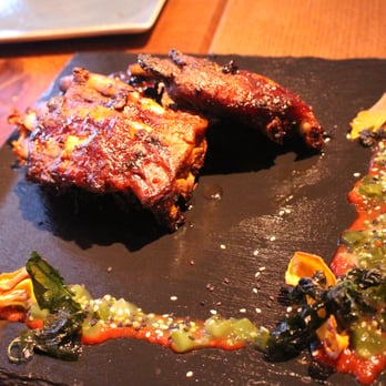 Pantry - "Iberico Spare Ribs" with Pimentos de Padron, Wild-Herbs-Salad & Pantry-Fries - Modern European Near Me - Berlin, BE Pantry - "Iberico Spare Ribs" with Pimentos de Padron, Wild-Herbs-Salad & Pantry-Fries - Modern European Near Me - Berlin, BE