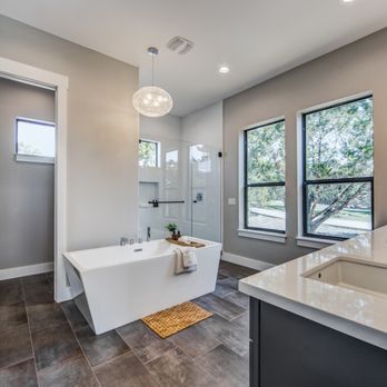 Southpass Design Build - bathroom with a tub, sink, and shower - General Contractors Near Me Southpass Design Build - bathroom with a tub, sink, and shower - General Contractors Near Me