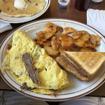 Silver Spoon - Steak omelette with home fries and white toast - Southern Near Me - Durham, North Carolina