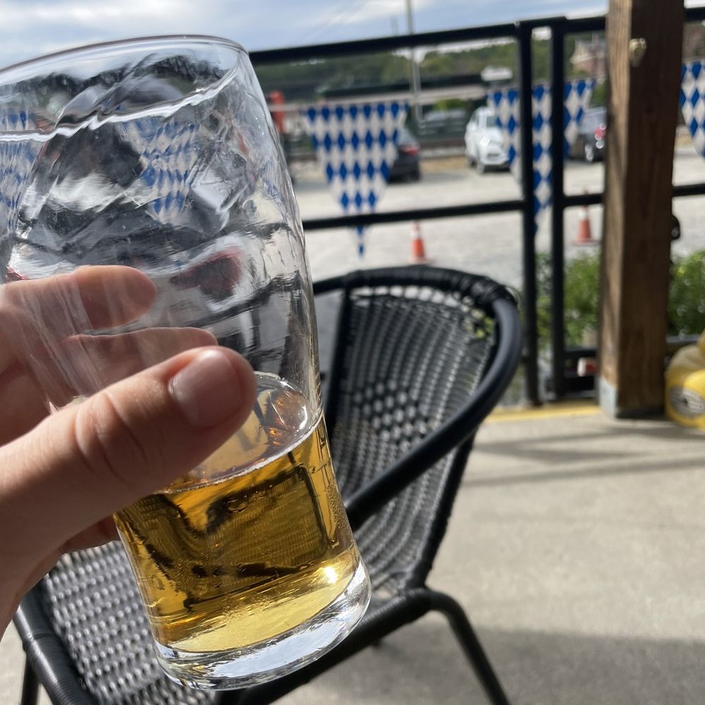 Railhouse Brewery - a person holding a glass of beer - Pubs Near Me - Aberdeen, North Carolina Railhouse Brewery - a person holding a glass of beer - Pubs Near Me - Aberdeen, North Carolina