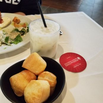 Fogo de Chão - Coconut cream cocktail and muffins. - Brazilian Near Me - Addison, Texas