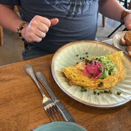Chorizo omelette. With Potato's & black refried beans. Chorizo omelette. With Potato's & black refried beans.