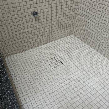 Modern Tile - Hidden drain that Garik expertly tiled - Tiling Near Me
