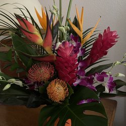 Just received this beautiful tropical bouquet from A Family Tree Florist. I don't often write reviews, but this bouquet is a 10!