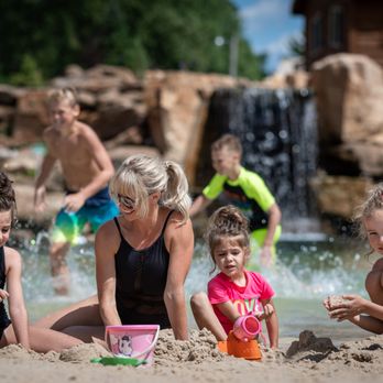 Natura Treescape Resort - Natural Lagoon with White sand beach - Too much fun for the Family - Hotels Near Me - Wisconsin Dells, Wisconsin Natura Treescape Resort - Natural Lagoon with White sand beach - Too much fun for the Family - Hotels Near Me - Wisconsin Dells, Wisconsin