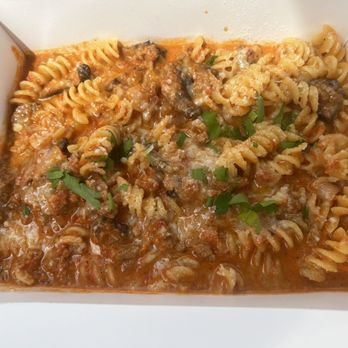 Guicho's Eatery - Fusili special with tomato cream sauce and sausage - Italian Near Me - Carpinteria, California Guicho's Eatery - Fusili special with tomato cream sauce and sausage - Italian Near Me - Carpinteria, California