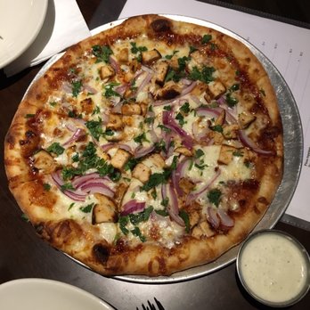 We're Pouring - Barbecue chicken pizza. Comes with Parmesan and crushed red pepper you ask nicely. - Gastropubs Near Me - Glendale, California We're Pouring - Barbecue chicken pizza. Comes with Parmesan and crushed red pepper you ask nicely. - Gastropubs Near Me - Glendale, California